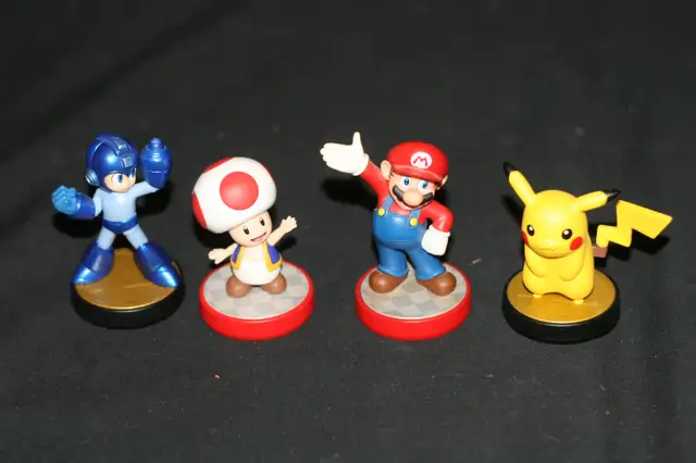 NINTENDO AMIIBO PIKACHU. MEGA MAN, SUPER MARIO, TOAD LIKE NEW