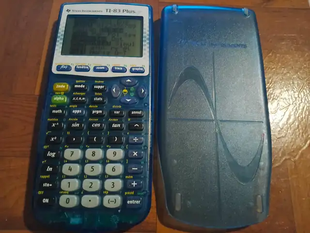 Texas Instruments TI 83 Plus Clear Transparent Blue Calculator