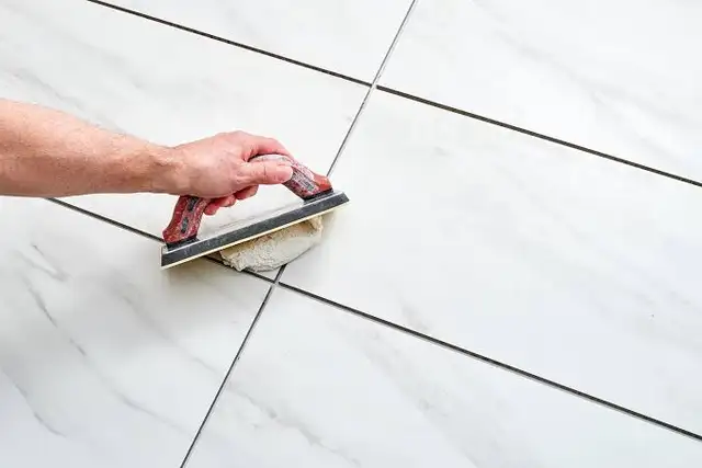 Tile grouting