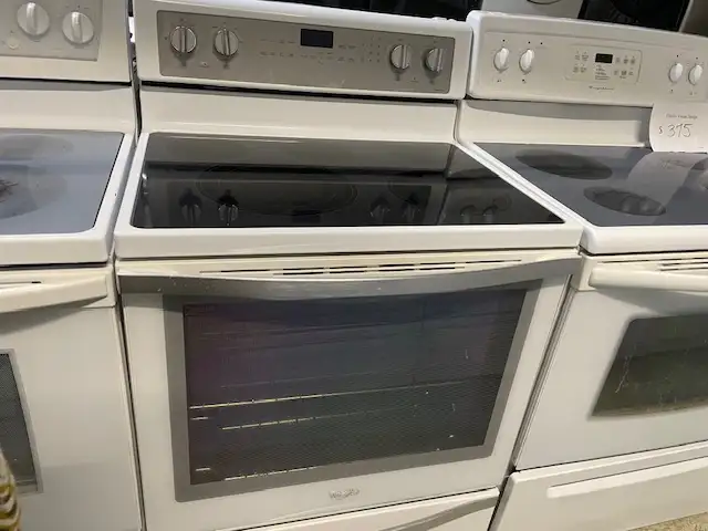 Cuisinière blanche vitrocéramique convection Whirlpool