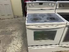 Cuisinière blanche vitrocéramique Whirlpool