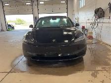 2025 Tesla Model 3 - Photo 2