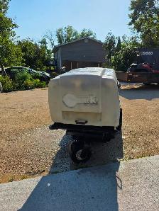Exmark Navigator zero-turn mower in good working condition. - Photo 2