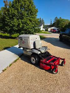 Exmark Navigator zero-turn mower in good working condition. - Photo 4