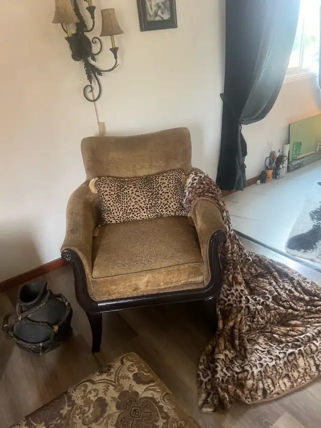 2 Green Bombay accent chairs with leopard pillow