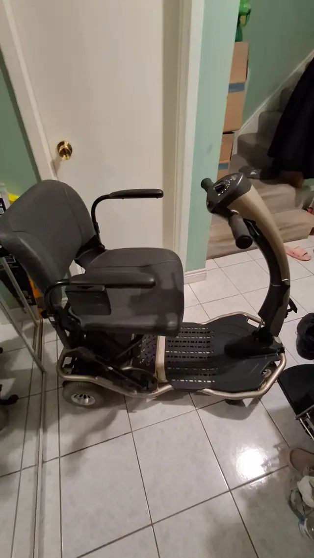 Electric wheelchair folding traveler scooter