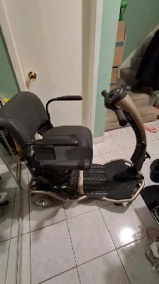 Electric wheelchair folding traveler scooter