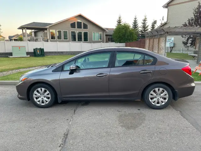 2012 Honda Civic - $7,599.00 (174,000km)