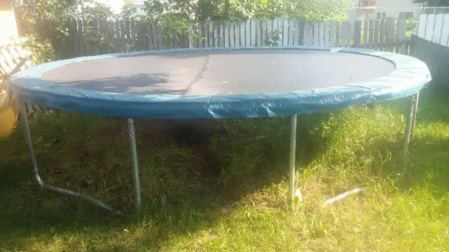 15ft Trampoline (Comes with Net) $150 obo