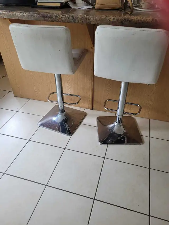 2 White leather bar stools