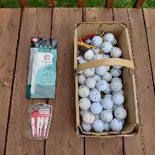Lot de 54 balles de golf, gant et accessoires