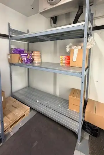 Steel rack for stores and home Price $199 obo (New rack is $599