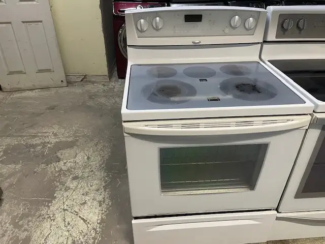 Cuisinière blanche vitrocéramique Whirlpool