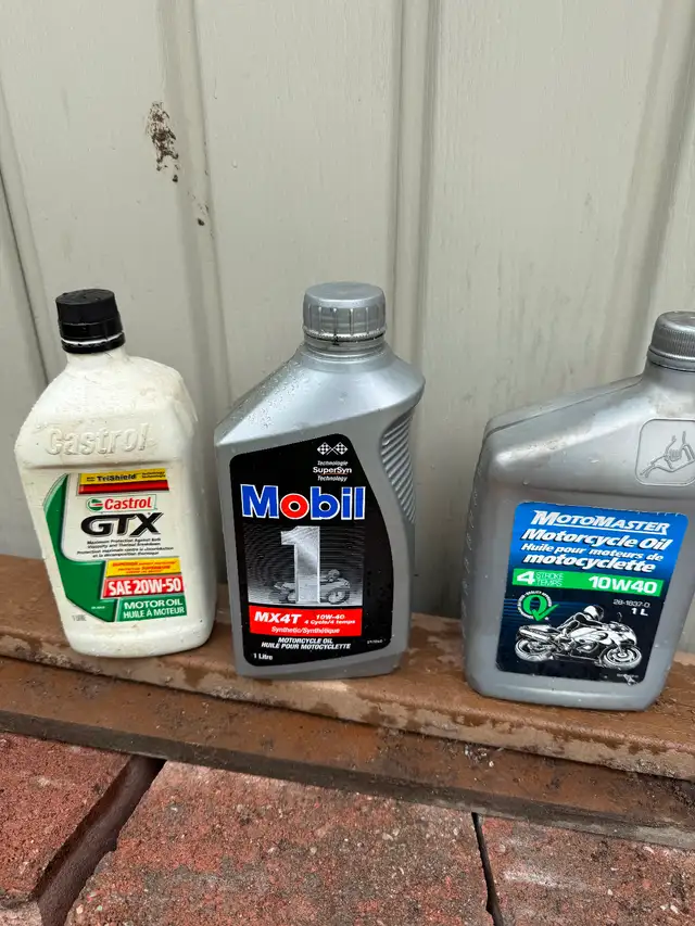 Unopened 10w30 synthetic motorcycle oil and 20W50 Ool