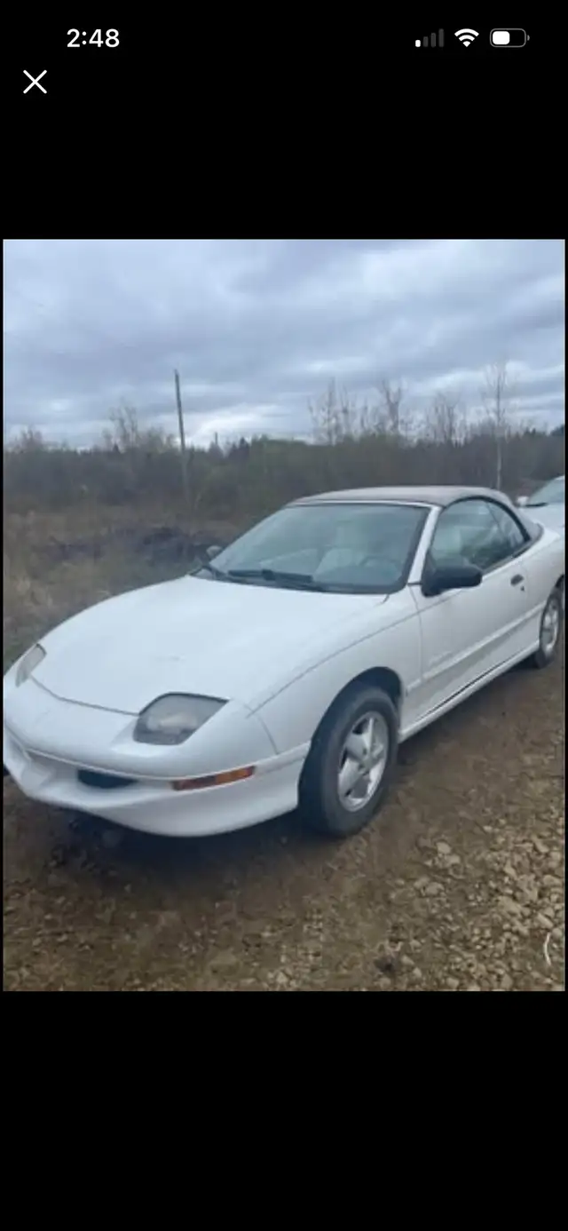 White on white 1998 convertible sun fire