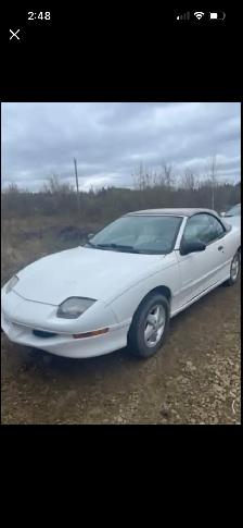 White on white 1998 convertible sun fire