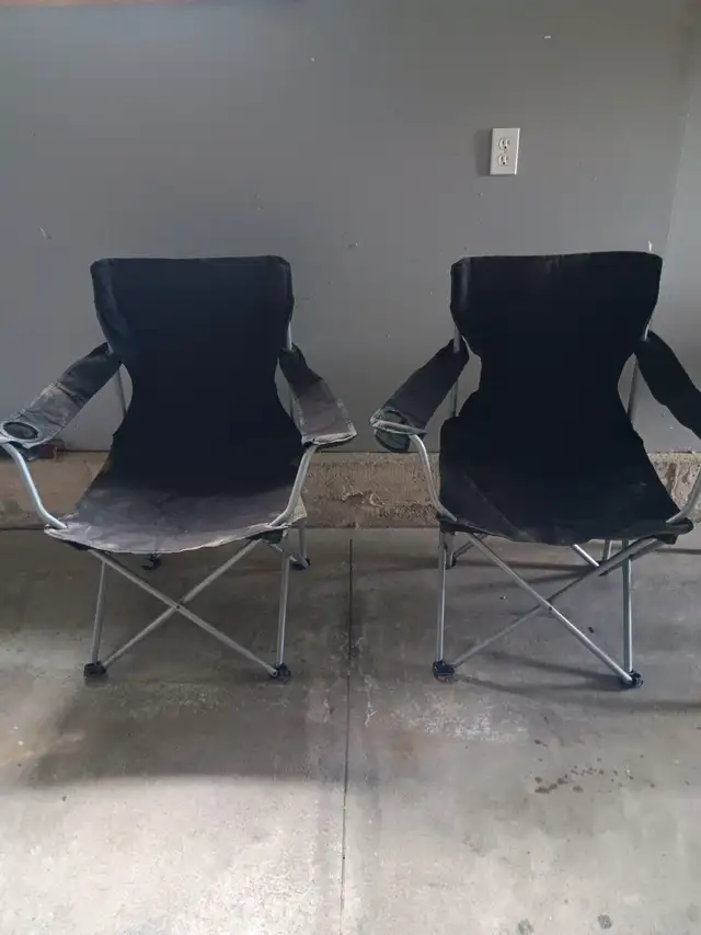 Two folding lawn chairs