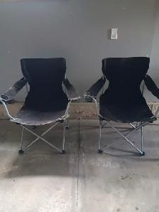 Two folding lawn chairs