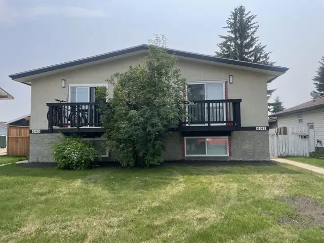 Renovated 3 Bedroom Duplex - Fenced Yard & Two Parking Stall