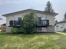 Renovated 3 Bedroom Duplex - Fenced Yard & Two Parking Stall