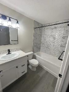 Renovated 3 Bedroom Duplex - Fenced Yard & Two Parking Stall - Photo 7