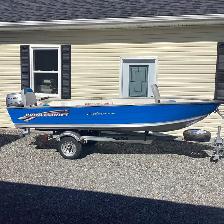 New 15 hp Honda outboard, 14 Princraft aluminum boat, trailer.