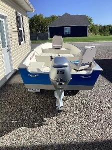 New 15 hp Honda outboard, 14 Princraft aluminum boat, trailer. - Photo 5