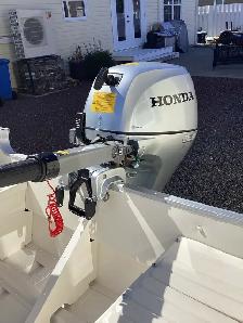 New 15 hp Honda outboard, 14 Princraft aluminum boat, trailer. - Photo 7