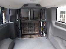 Wheel chair lift for a full size van