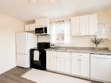 3-BEDROOM MAIN FLOOR | PRIVATE LAUNDRY | PARKING | $2,195 - Photo 3