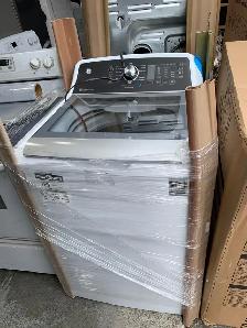 Washer - 27' GE GTW681BMRWS  5.3 Cu ft Top Load - White