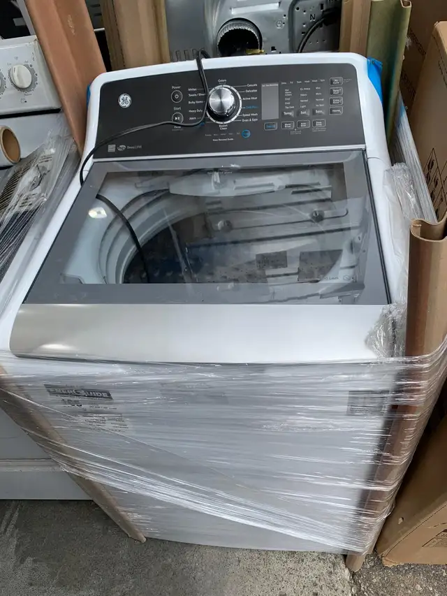 Washer - 27' GE GTW681BMRWS  5.3 Cu ft Top Load - White