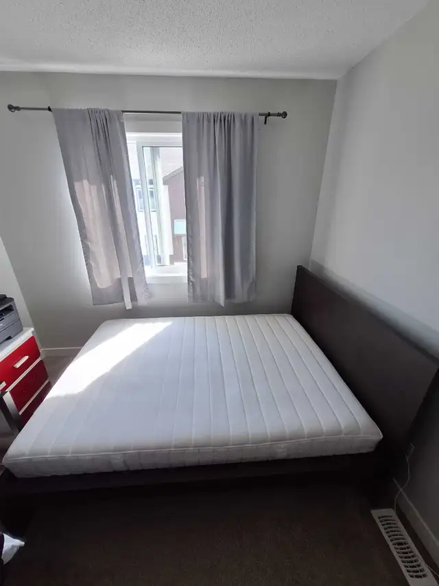 Brand new IKEA Full/Double Size Mattress and Bed Frame