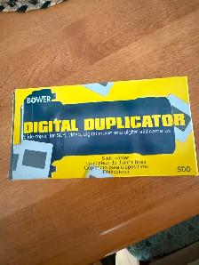 Slide copier for SLR, video, digital movie and still cameras