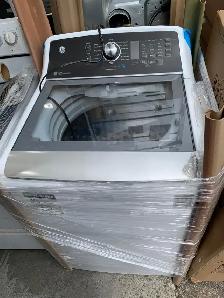 Washer - 27' GE GTW681BMRWS  5.3 Cu ft Top Load - White