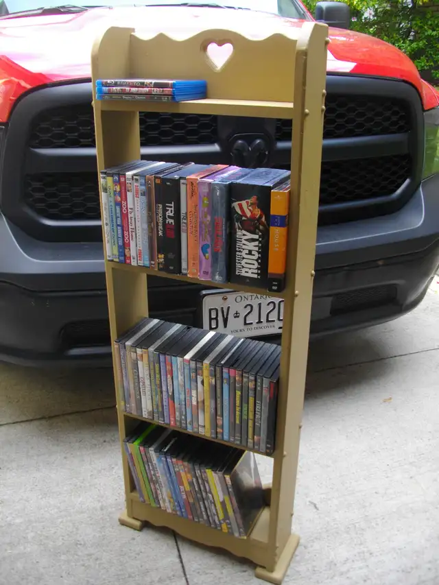 BOOK CASE FULL OF DVD MOVIES  $18 TAKES IT ALL