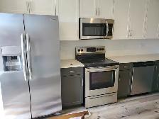Two Bedroom Plus Den Main Floor Rental in Brighton - Photo 2
