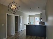 Two Bedroom Plus Den Main Floor Rental in Brighton - Photo 3