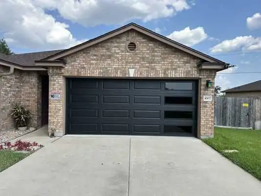 NEW GARAGE DOORS – Starting at $899