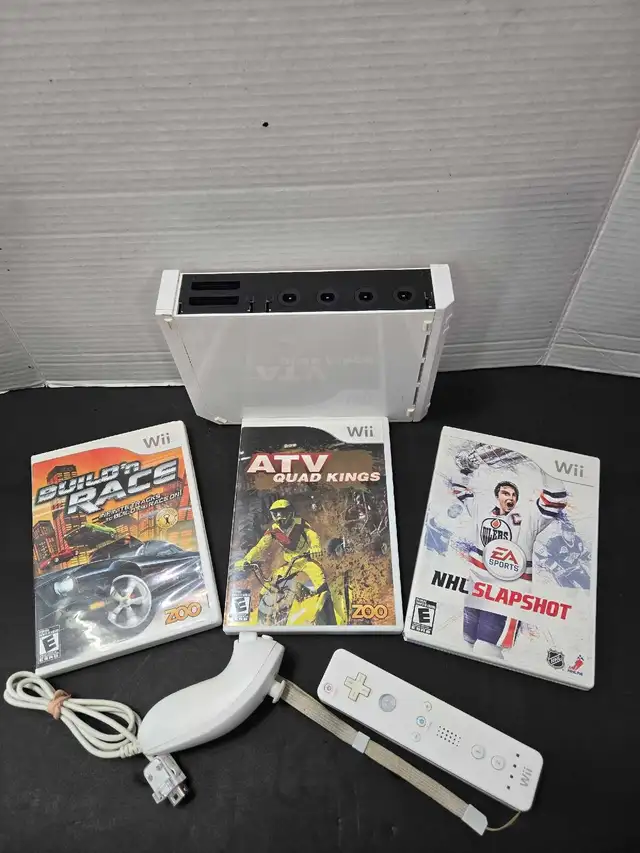 NINTENDO WII BUNDLE WITH 3 GAMES