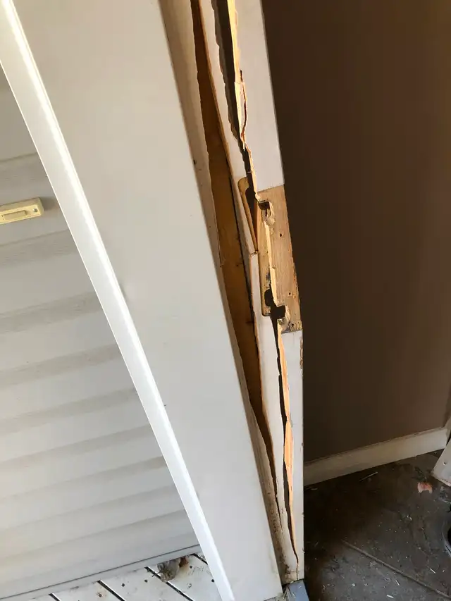 cracked exterior door, not closing properly we can fix. Servicin