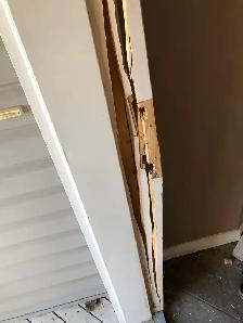 cracked exterior door, not closing properly we can fix. Servicin