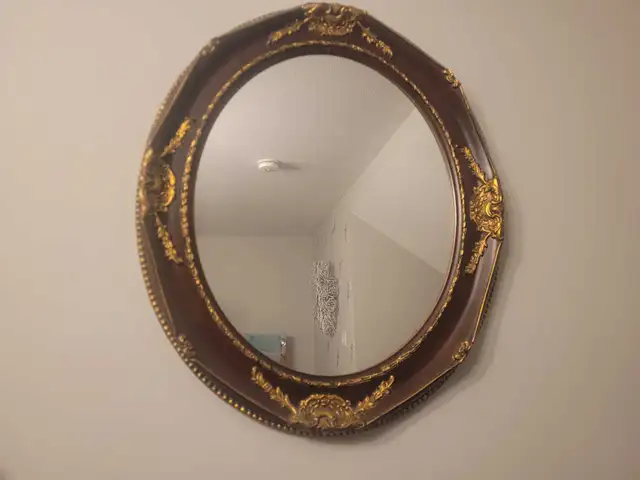 Ornate oval wall  mirror