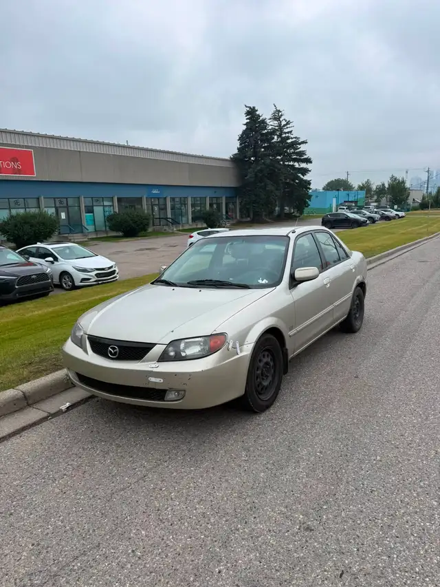 2002 Mazda Protege ES 2.0L — 4-door sedan
