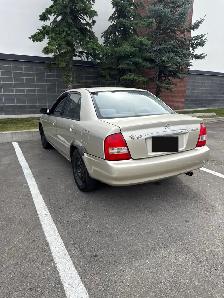 2002 Mazda Protege ES 2.0L — 4-door sedan - Photo 2