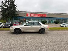 2002 Mazda Protege ES 2.0L — 4-door sedan - Photo 4