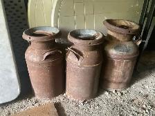 Old milk canisters