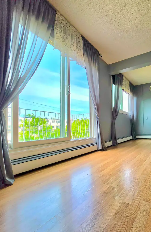 Spacious 2-storey 2 BR apt | parking   heat/water included