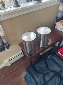 Two Stainless Steel Garbage Cans