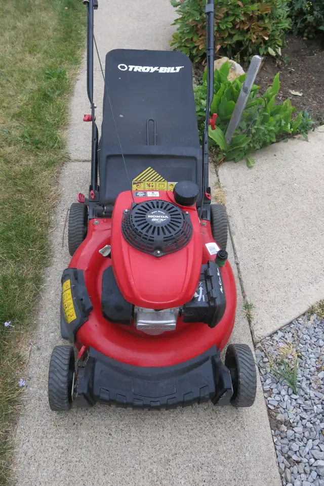 Troybilt push lawnmower-Honda engine. Tuned-up